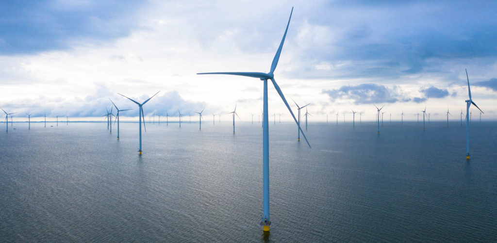 photo of an offshore wind farm requiring big bubble curtain hose for noise abatement